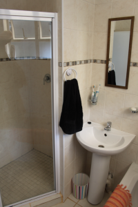 Recently renovated bathroom with bath and large separate shower